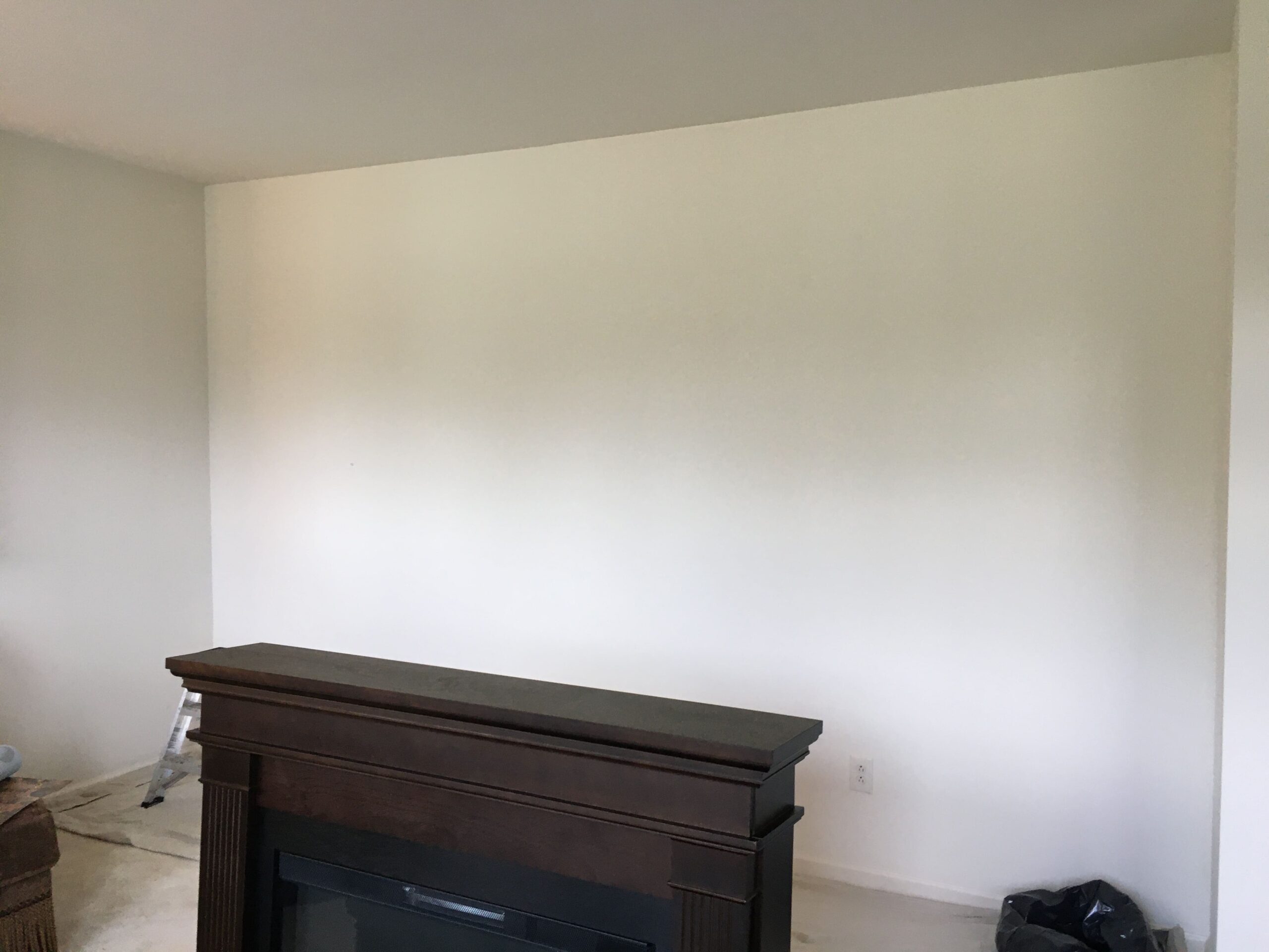 Plain prepared white wall ready for wallpaper installation.